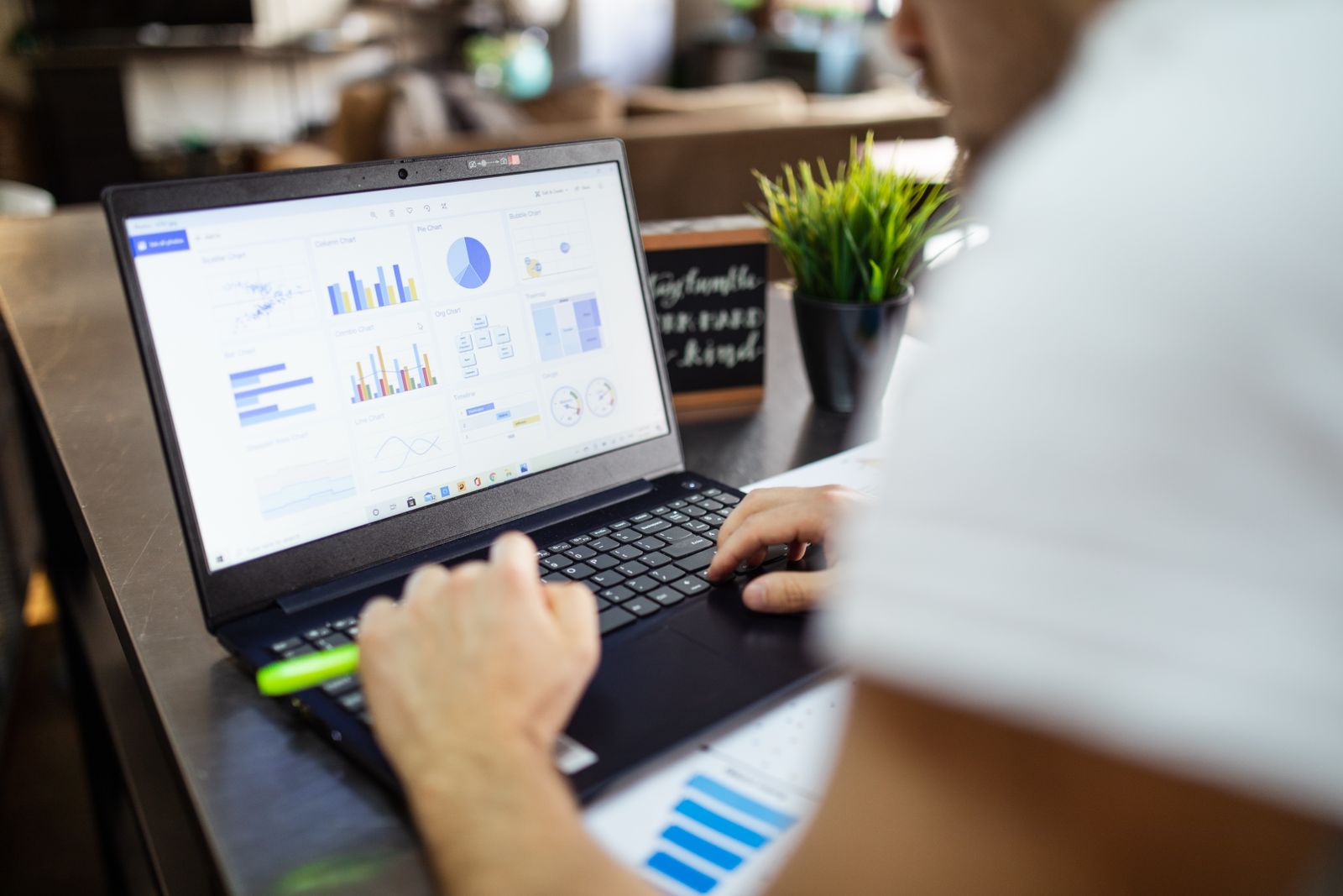 Financial charts and reports arranged for market research.